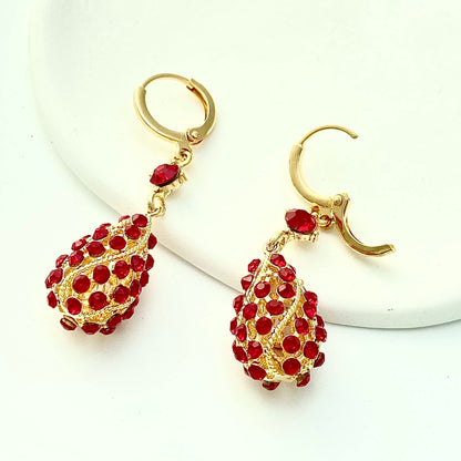 Pendientes rojos de moda con forma de lágrima en espiral