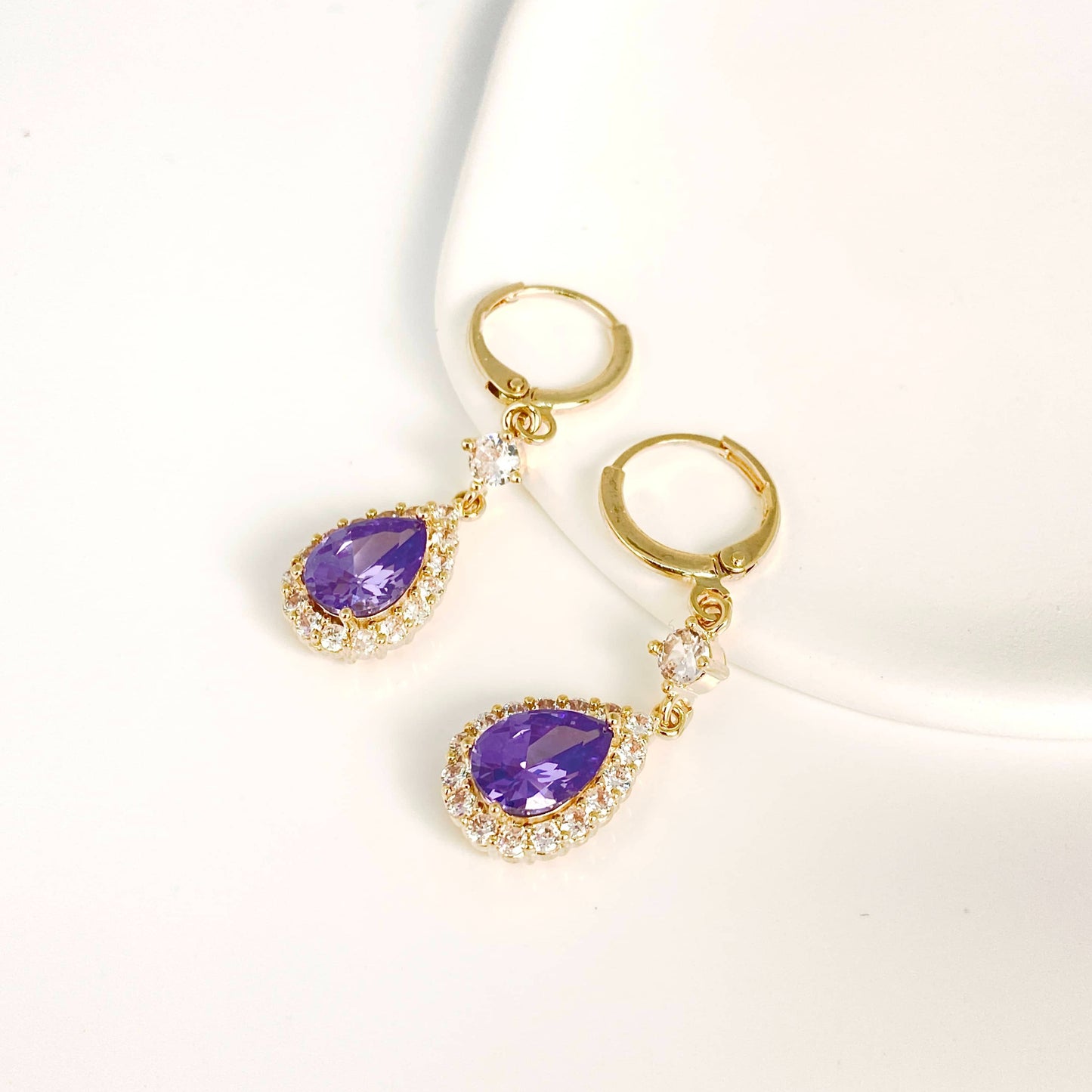 Purple teardrop-shaped crystal earrings