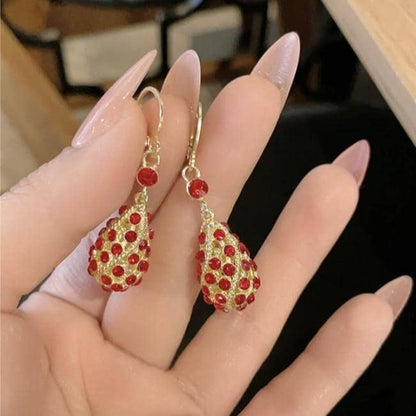 Pendientes rojos de moda con forma de lágrima en espiral