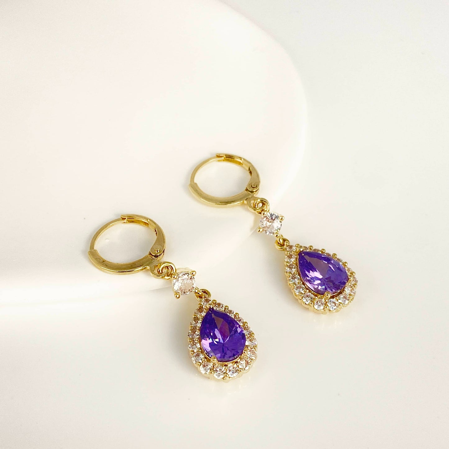 Purple teardrop-shaped crystal earrings