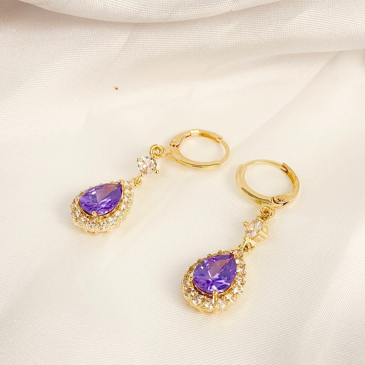 Purple teardrop-shaped crystal earrings